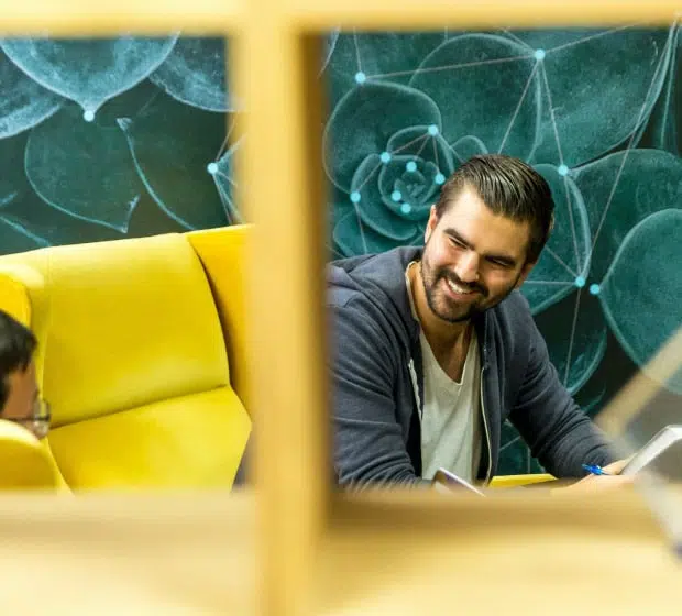 Man smiling on couch